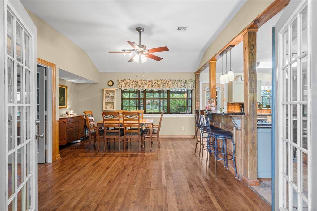 Upon entering the home you will find a spacious dining area with hardwood floors and large windows for natural light.