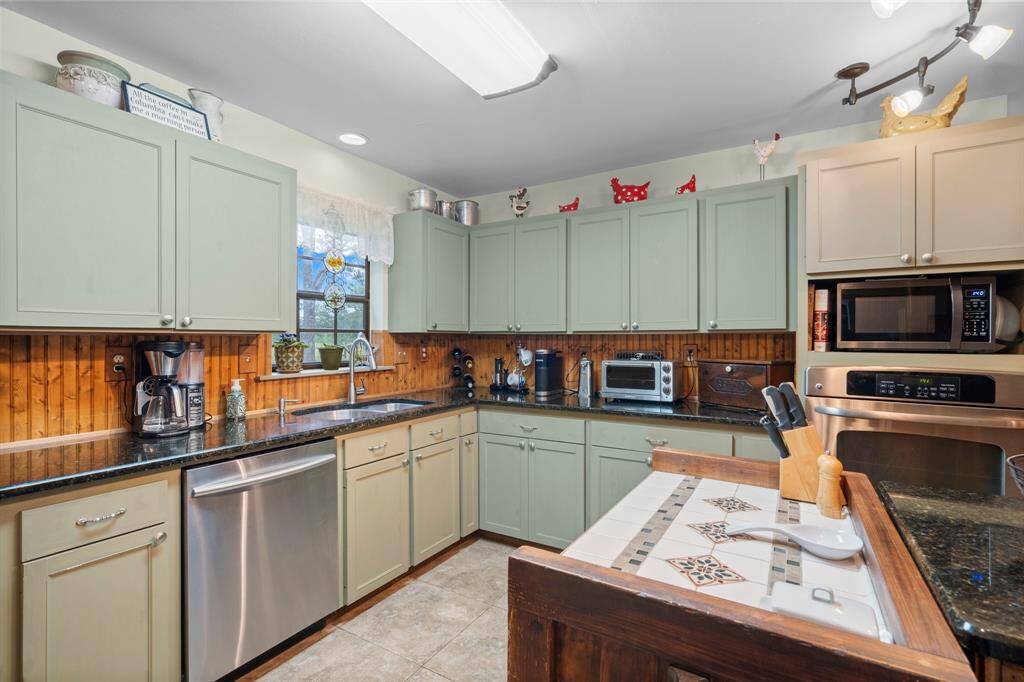 Ample counter space and a window over the sink looking out to the back yard.