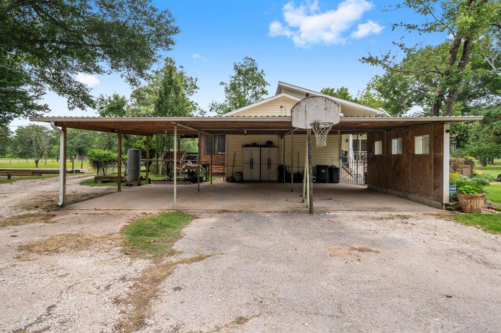 Shown here is the three-car covered carport.