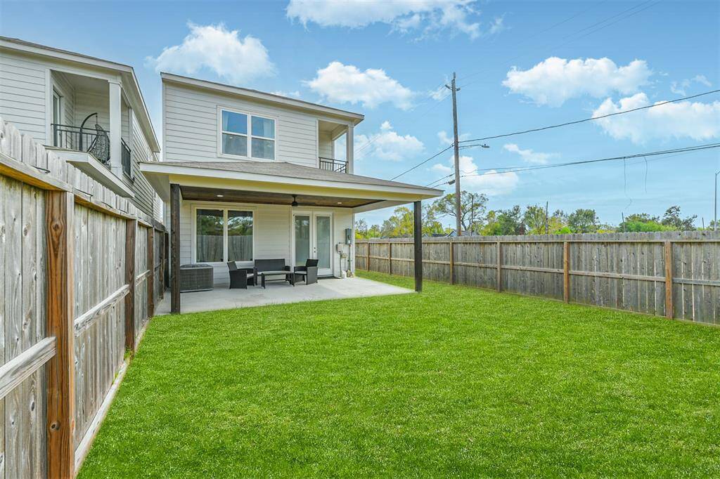 An over 3500 square foot fully fenced in lot provides plenty of flex space to create the ultimate oasis.