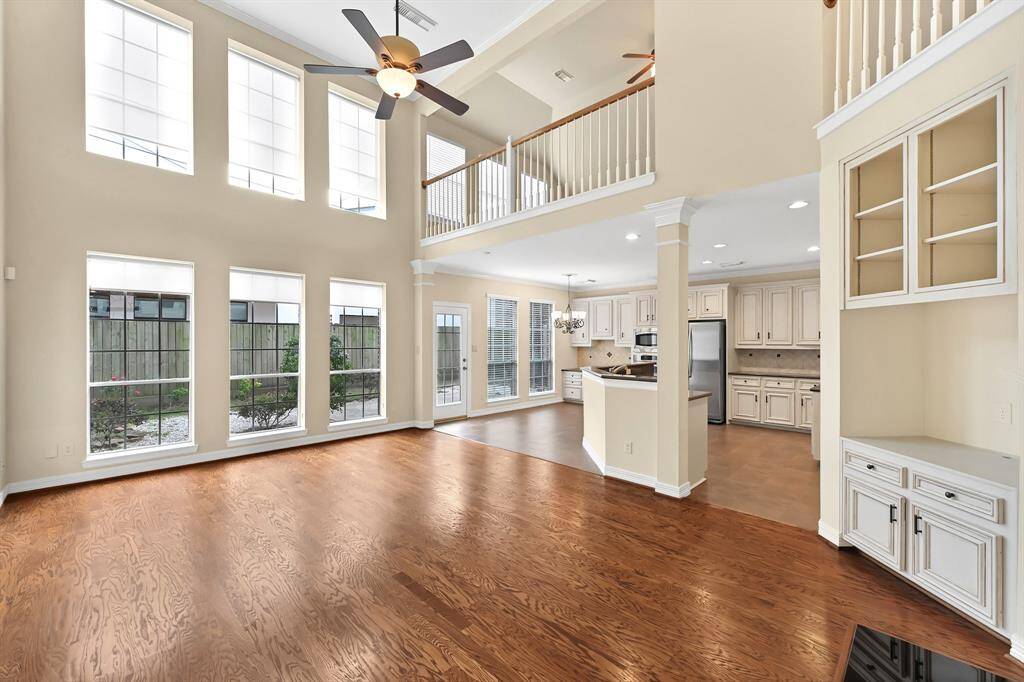 Light filled Den with built-ins and Fireplace opens to the kitchen and Breakfast room