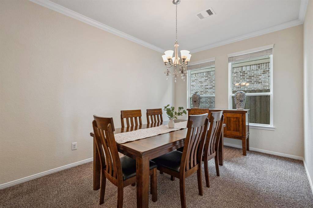This Ashley Furniture set featuring table, 6 chairs and buffet will be sold with the home