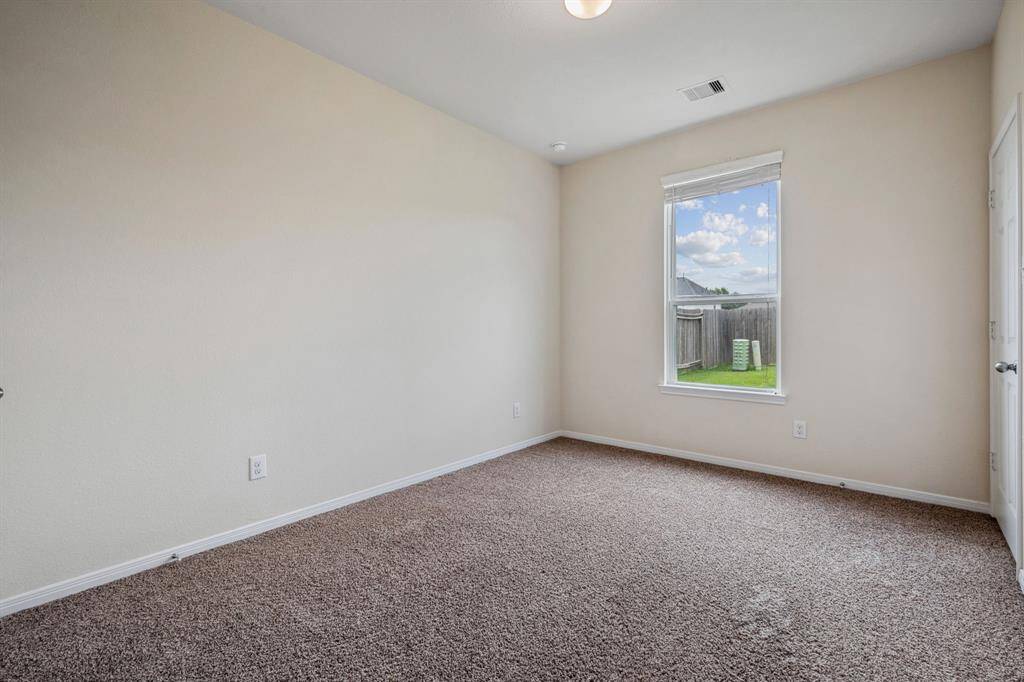 The office/4th bedroom has a window w/ views of the backyard