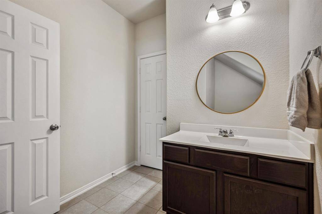 The 1st floor has a powder bath that is accessible from the office as well the hallway