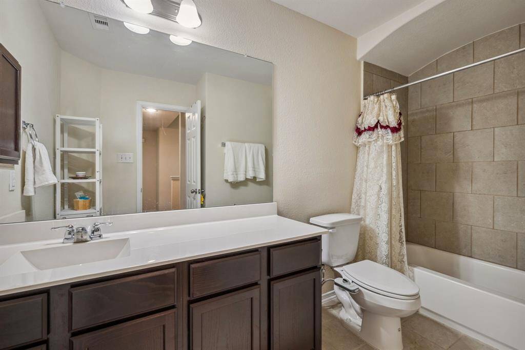 There is a full bath that services secondary bath #1 & #2