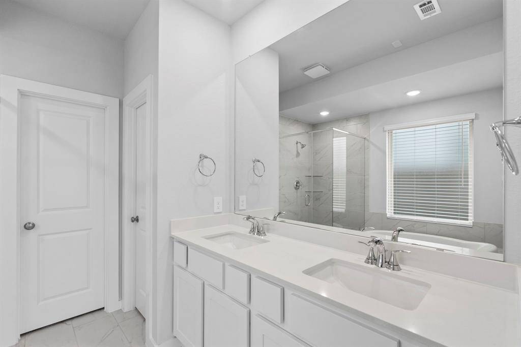 Another view of the primary bathroom.