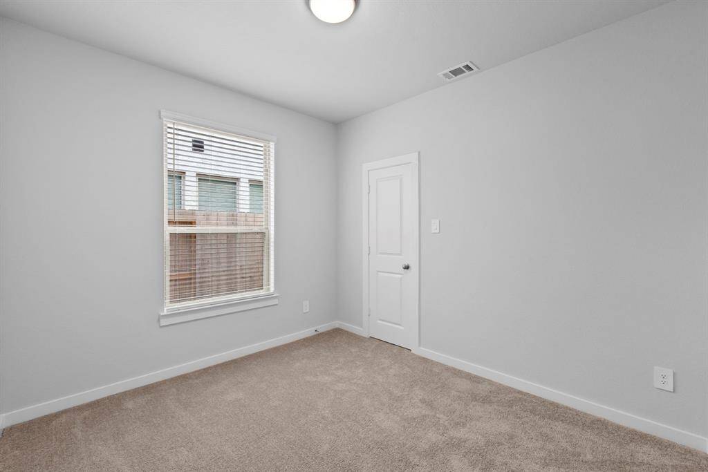 Bedroom number two located on the first floor.