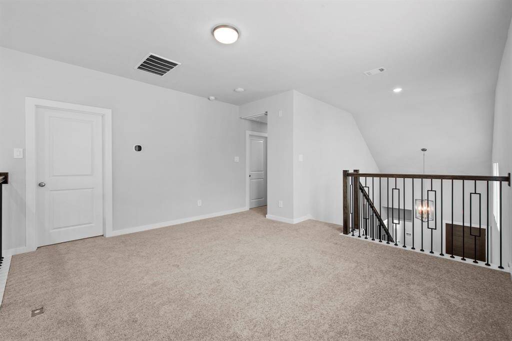 As you go up to the second floor you will find the spacious game room and access to the two other bedrooms.