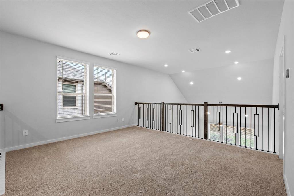 This amazing game room is perfect for entertaining, offering plenty of space for fun, laughter, and making memories.