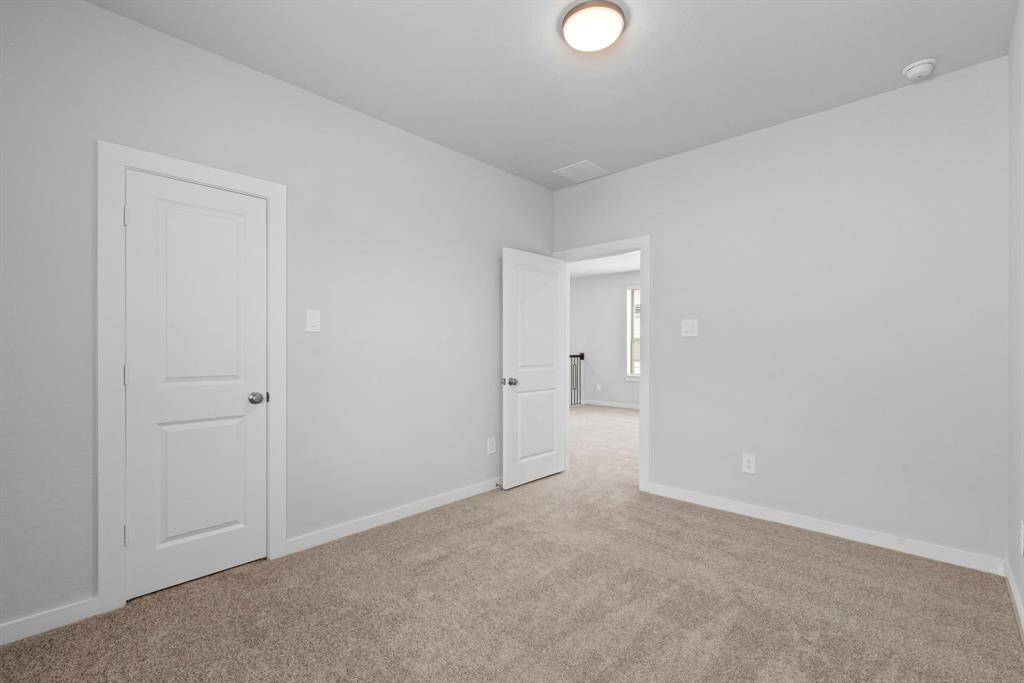 Another view of bedroom number three.