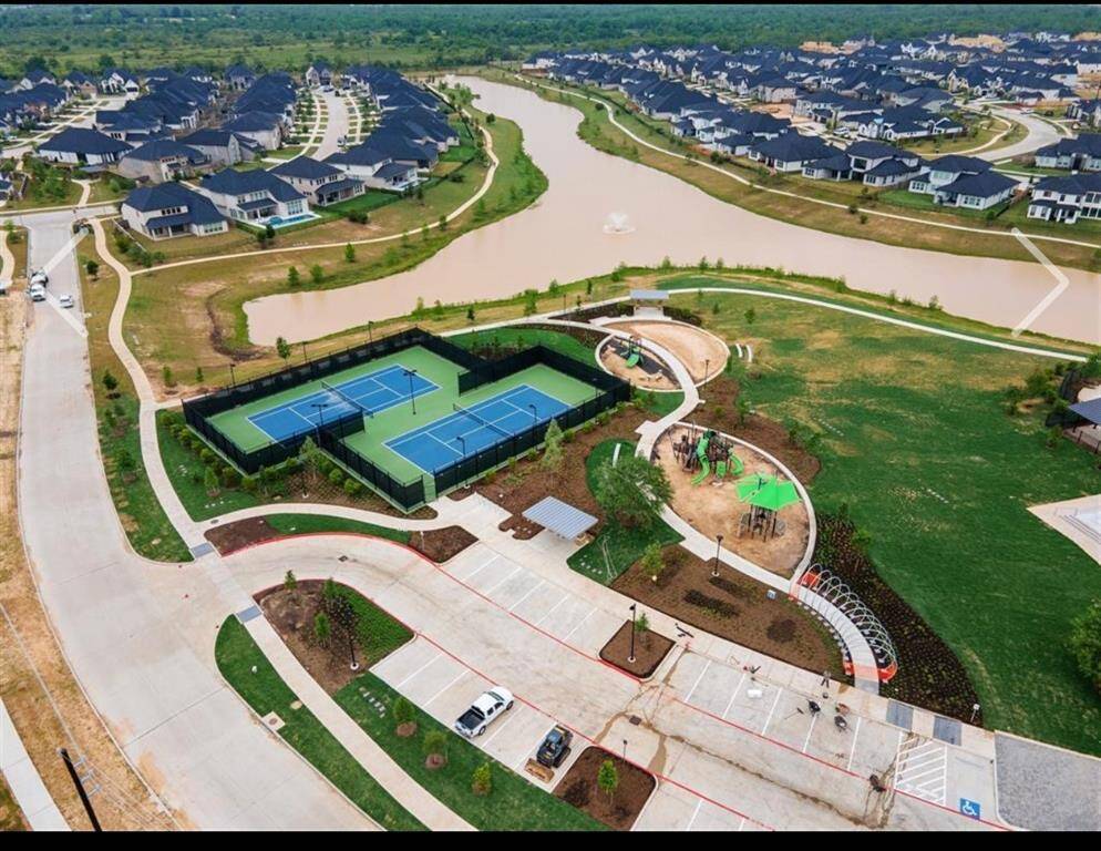 Tennis courts, Fitness Center playgrounds, and resort style pool nearby at The Landing.