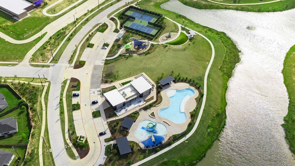 Tennis courts, Fitness Center playgrounds, and resort style pool nearby at The Landing.