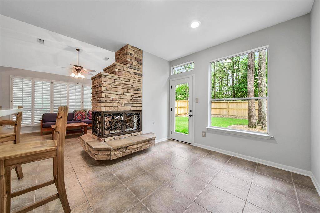 The breakfast room on the other side of the fireplace is a cozy space that's just the right size for a table and chairs.