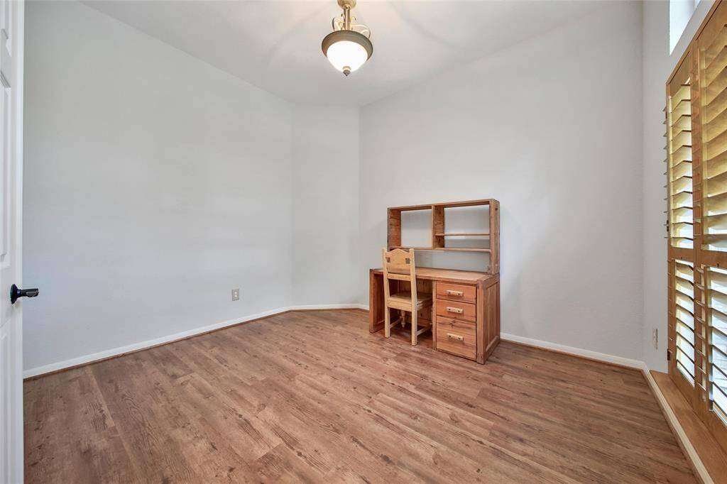Easily work from home in the executive office at the front of the home.
