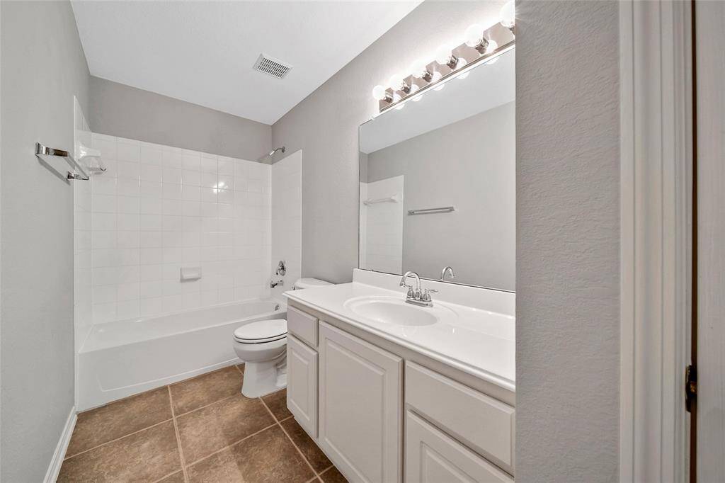 The first floor sescondary bath is just outside the bedroom and easily accessible to guests.