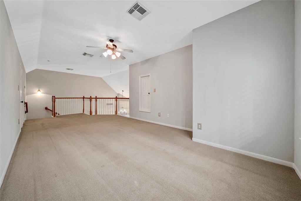There's room for a smaller sized pool table or make this the best hobby room.