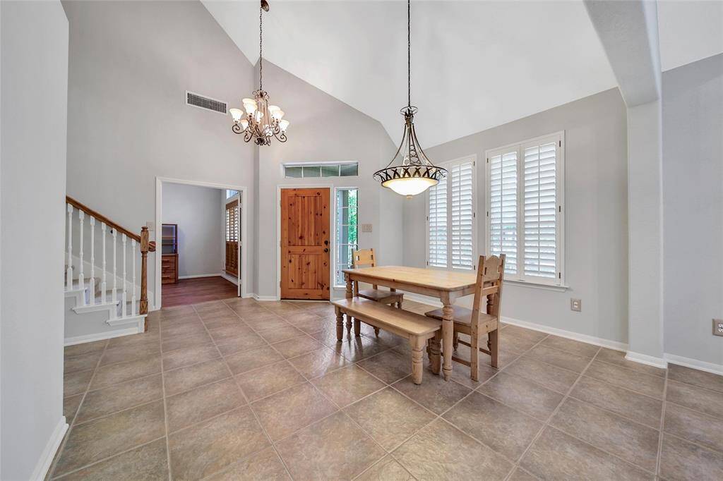 The formal dining room at the entrance is a flexible space that can be customized to your needs.