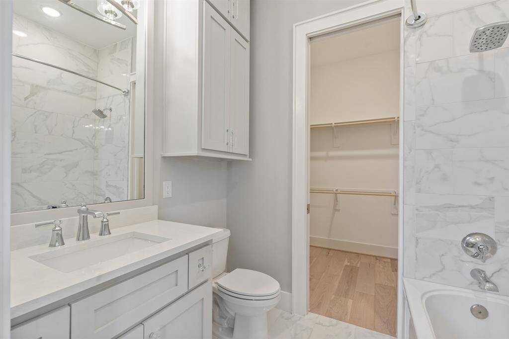 Luxurious ensuite bathroom with walk in closet.