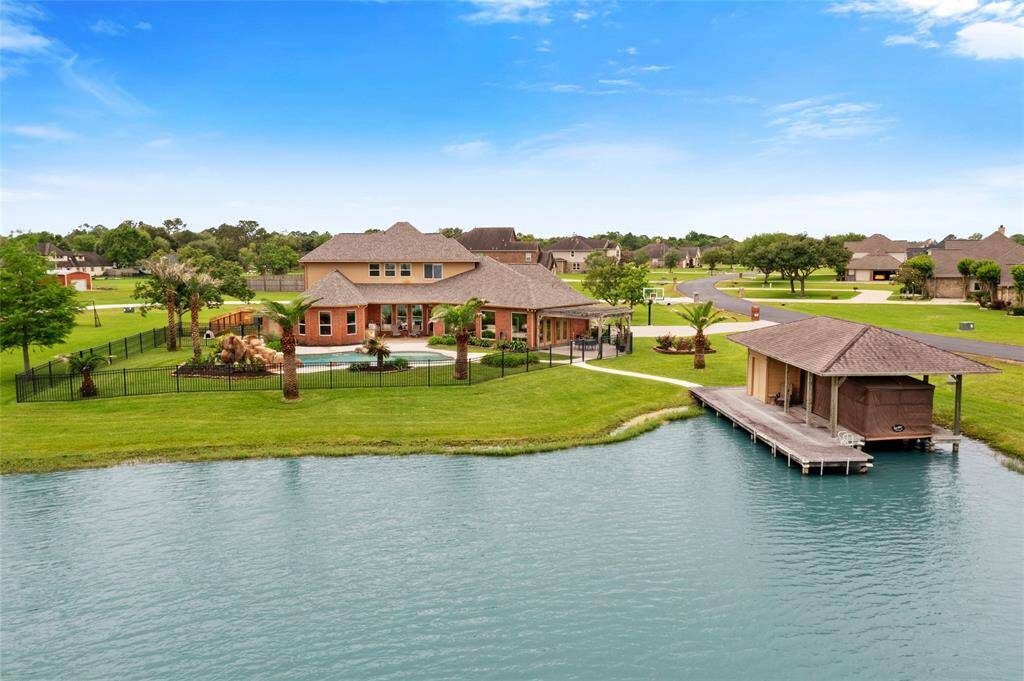 Welcome to lakeside living at 303 Lago Circle Drive in the beautiful, gated, ski-lake community of Lago Santa Fe.
