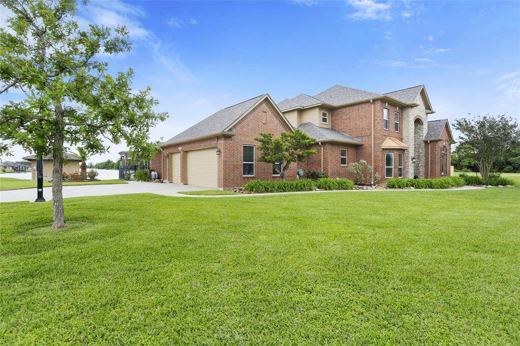 Take advantage of the expansive 3-car garage, thoughtfully designed to accommodate a truck, boat with trailer, or golf cart with ease.