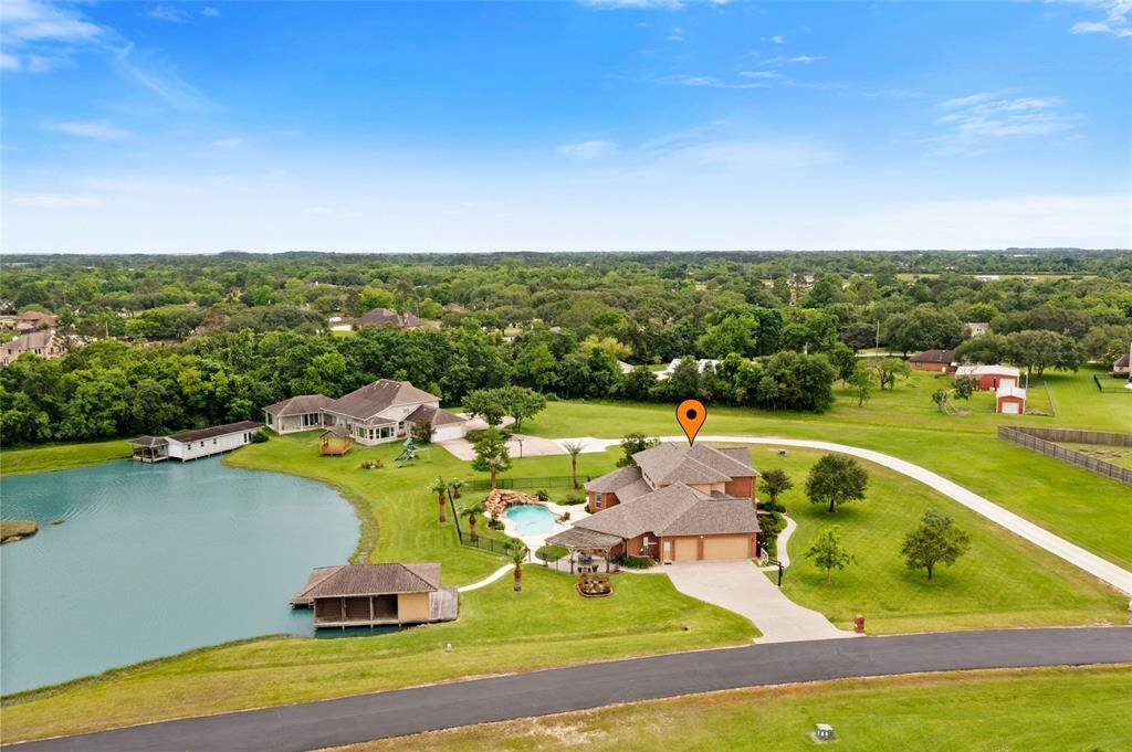 This home is nestled at the back of the neighborhood and bordered by a wooded reserve, offering a quiet and serene setting for ultimate privacy and tranquility.
