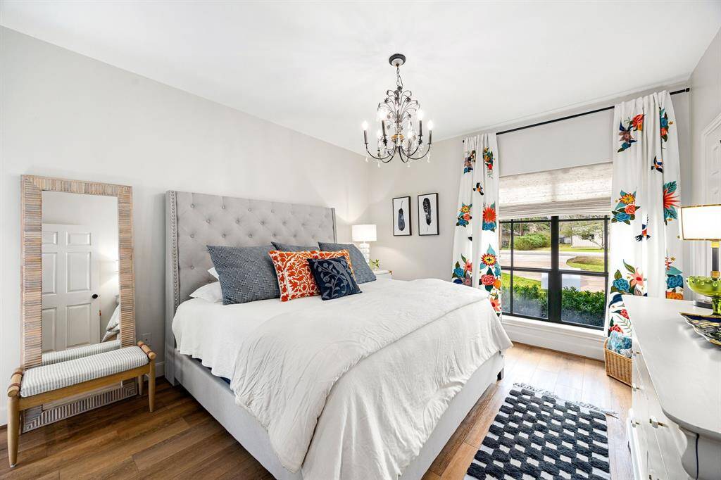The downstairs secondary bedroom, complete with a renovated en-suite bath, provides your guests with both privacy and comfort.