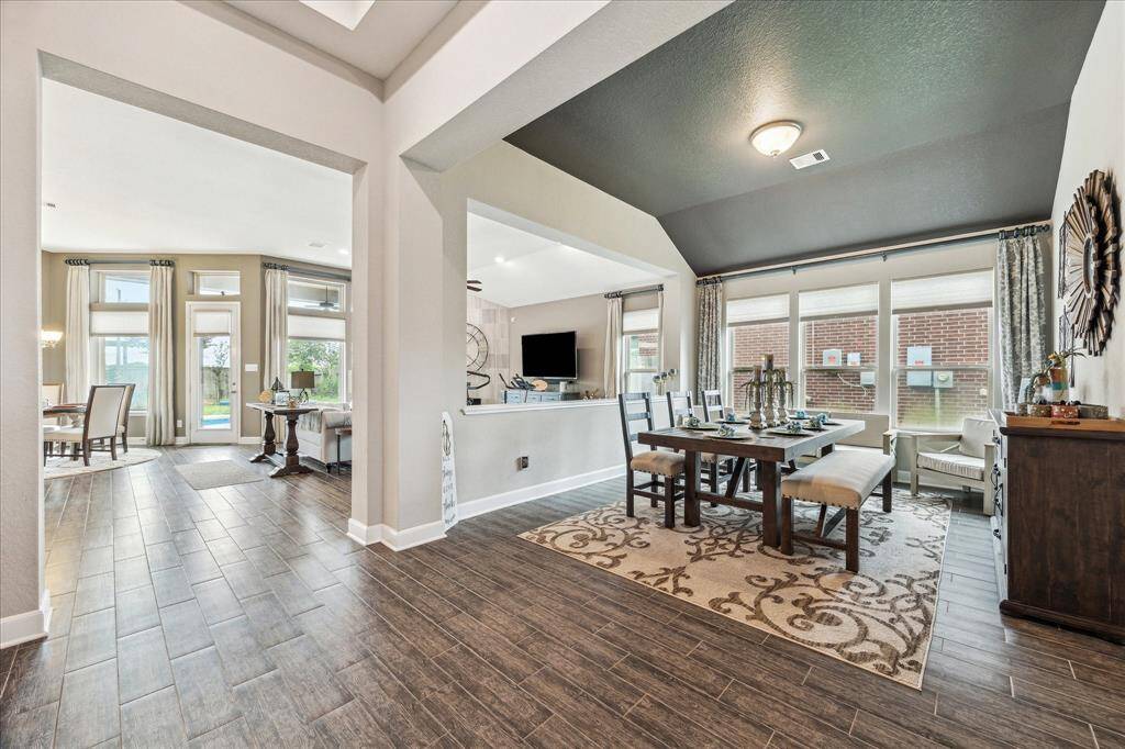 Open concept to the living and flex room