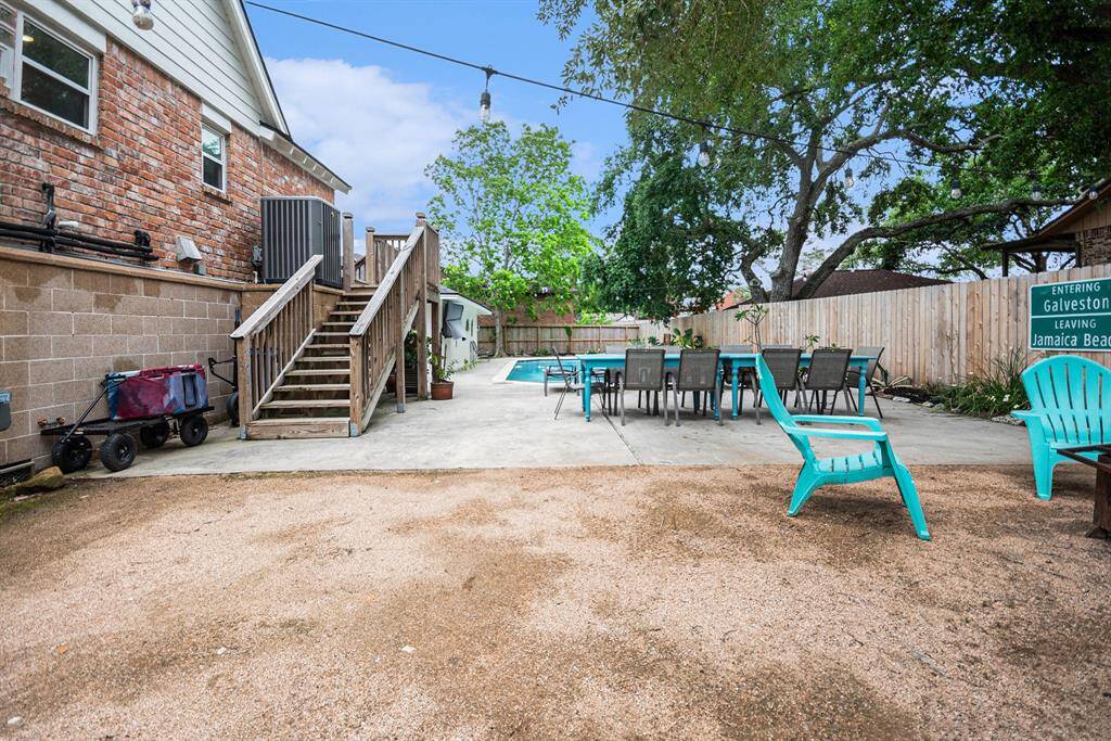 Plenty of deck area and dirt area for a firepit.