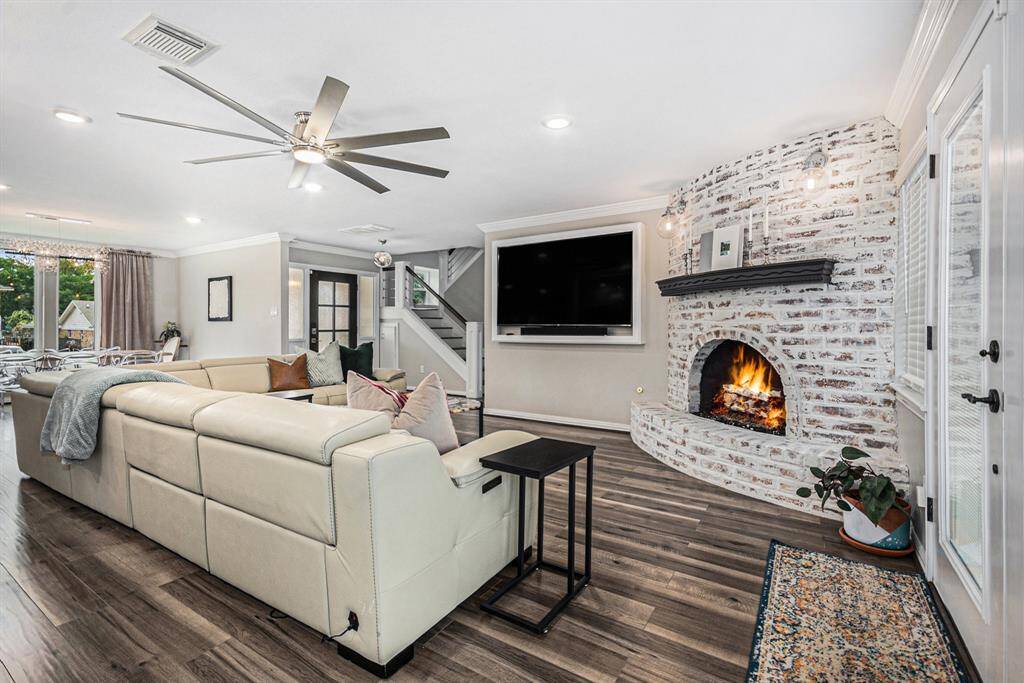 Large family room with gas fireplace.