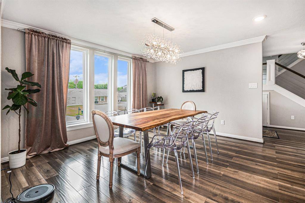 Dining room with large picture windows.