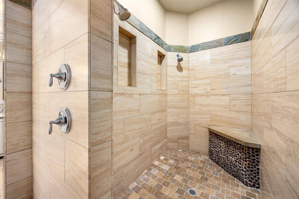 You will never want to leave this spa-like walk-in shower.