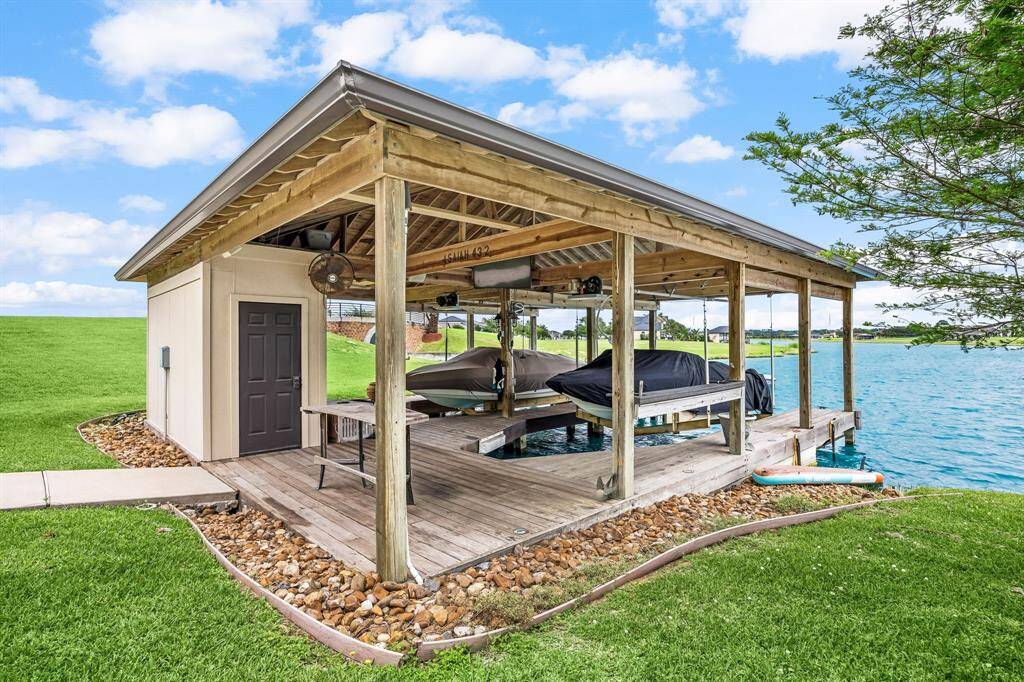 Rare double boat slip with plenty of storage for your ski gear and lake toys.