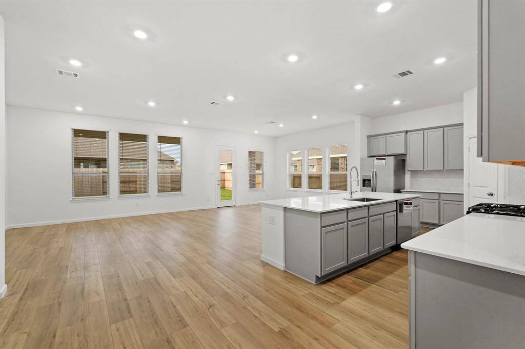 View from the Kitchen to the Dining Area and Living Room, imagine the possibilities!