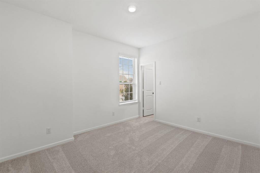 Another view of the Secondary Bedroom and space it has to offer as well as access to private full bathroom.