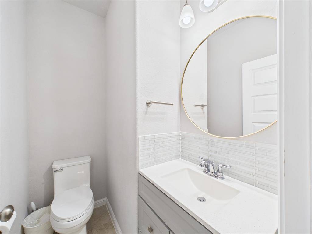 half bath by the study and laundry.