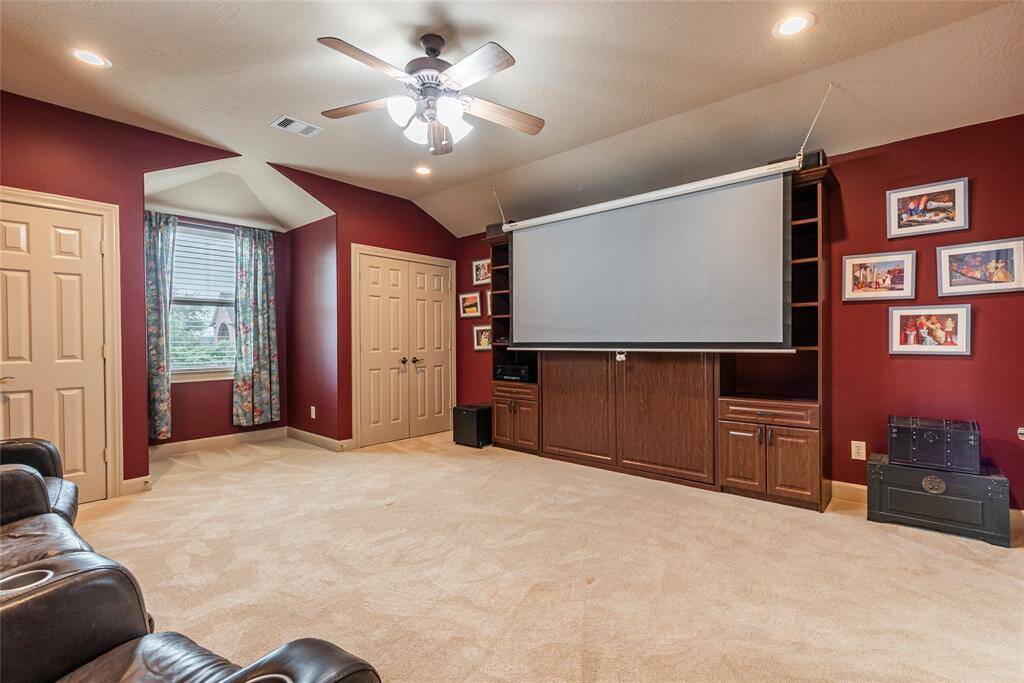 Family movie night has never been more fun! The large fifth bedroom has been transformed into a cozy media room, complete with a projector, screen, surround sound speakers, and a built-in Murphy bed—offering the perfect blend of comfort, entertainment, and versatility for guests.