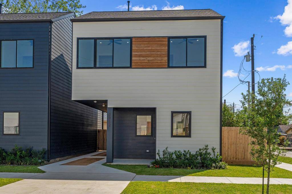 Exterior with Covered Patio and Driveway