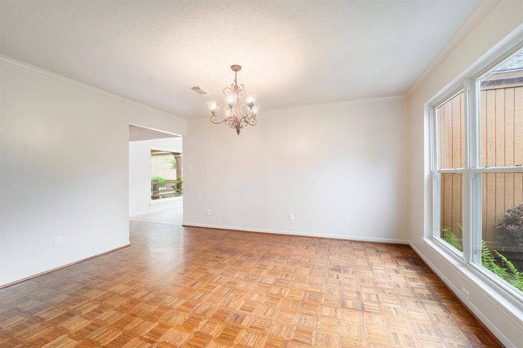 The windows let you enjoy the landscaping out front giving meals a little extra charm and privacy.