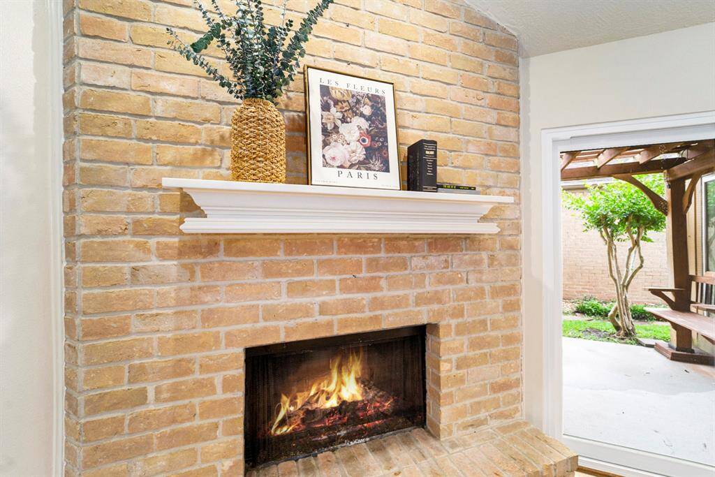 The homes layout is perfect for both relaxing and entertaining, with the fireplace serving as a natural focal point.