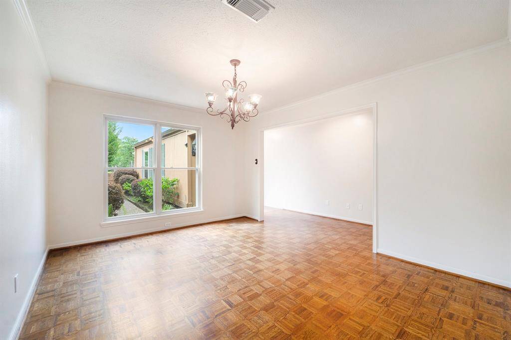 The dining room is a comfortable, light filled space with a nice view of the homes private front entrance. It's got just the right amount of separation to feel like its own area, while still being open enough to keep things connected. Perfect for everything from weeknight dinners to weekend get-togethers.