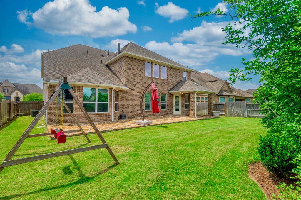 BACK YARD IS SPACIOUS LEAVING PLENTY OF ROOM TO RUN AND PLAY!