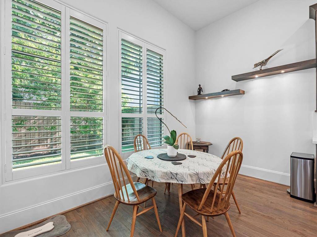 The kitchen nook is conveniently located for the kitchen and is bathed in natural light.