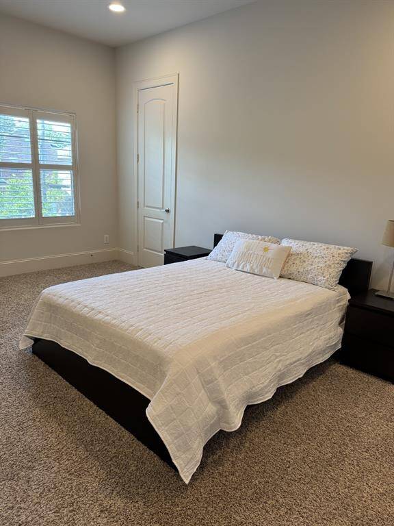 Bedroom 2 - has a good-sized closet and high ceilings.