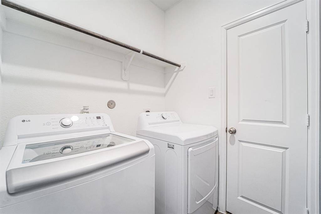 Laundry with Door From Primary Closet