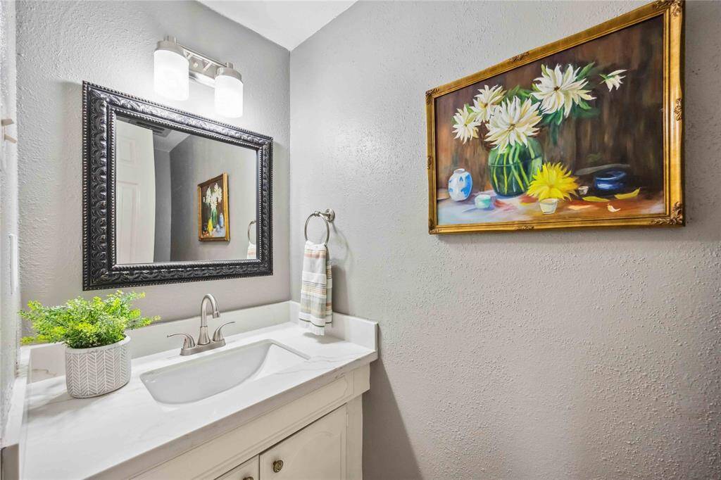 A convenient half bath is located on the 1st floor.