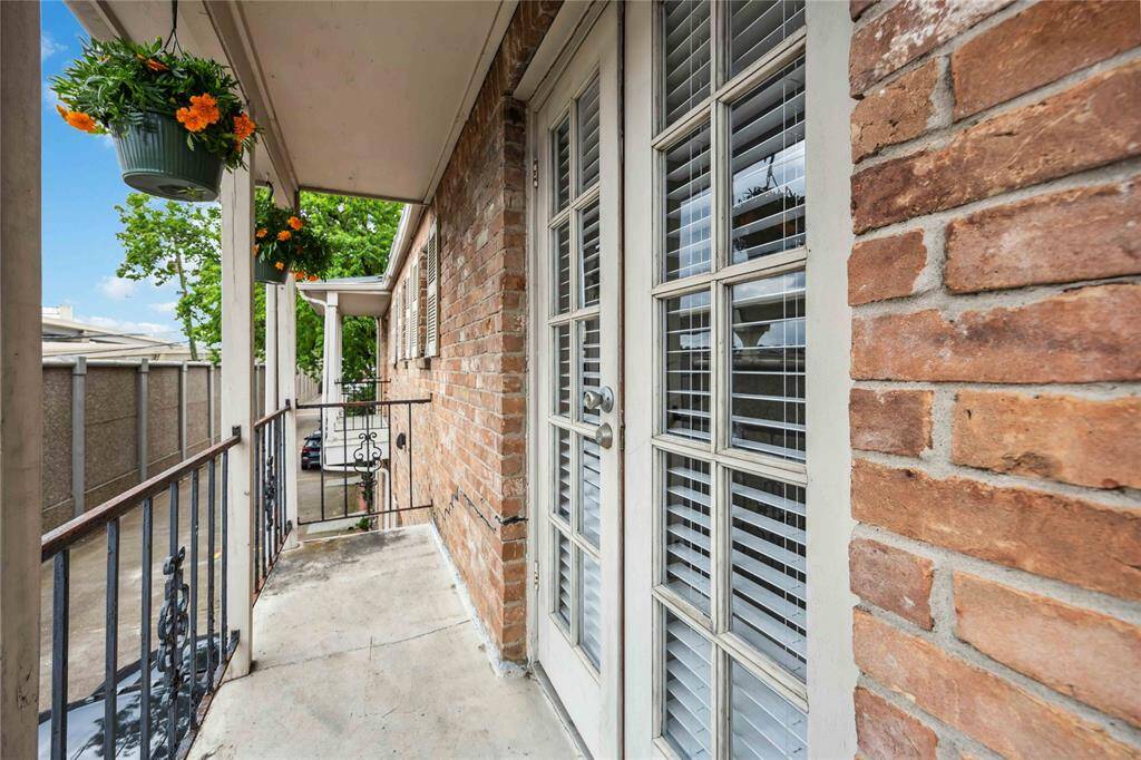 The cozy balcony off the primary offers an outdoor respite.