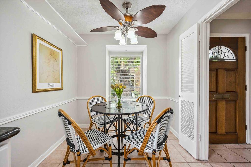 The breakfast room, just off the kitchen, rests at the front of the home.
