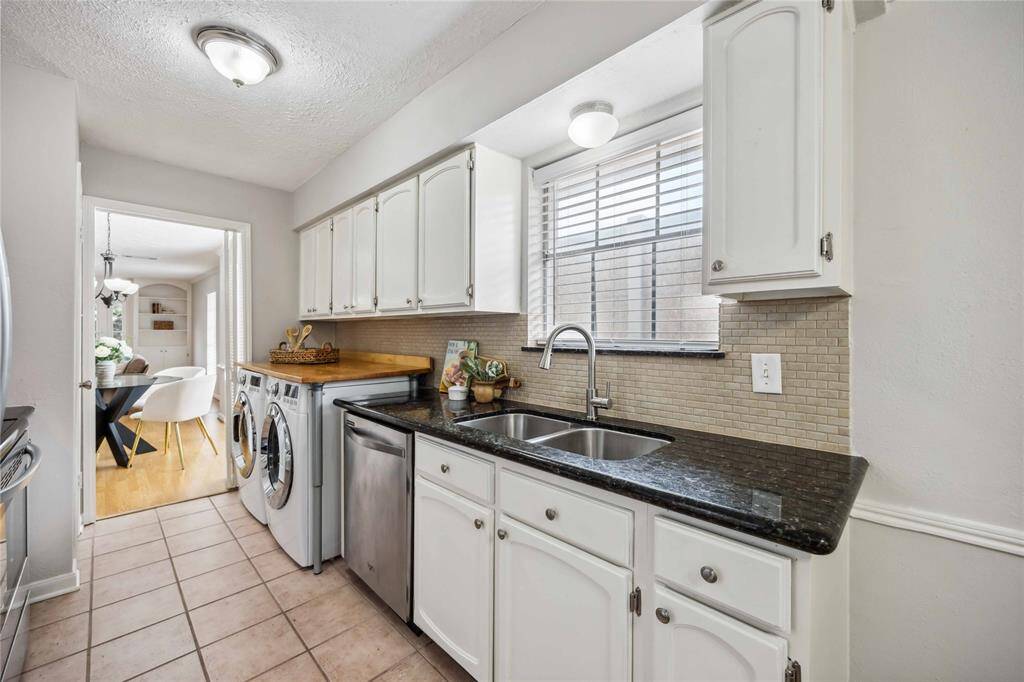 The more formal dining space is accessible from the kitchen.