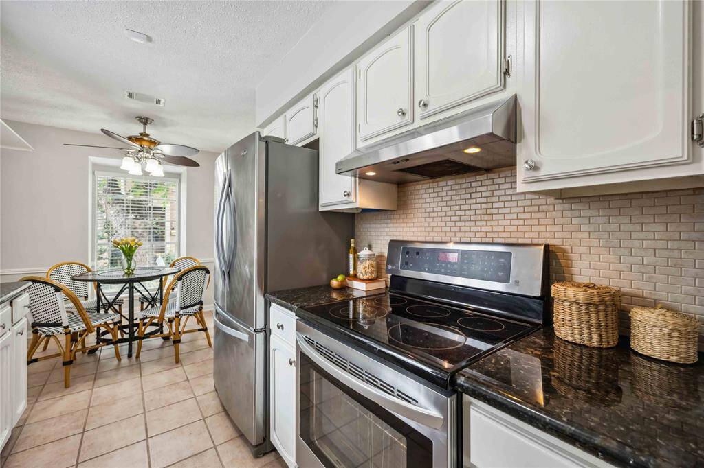 HOA covers electricity, water, and gas, and the washer, dryer, and refrigerator convey with the home.