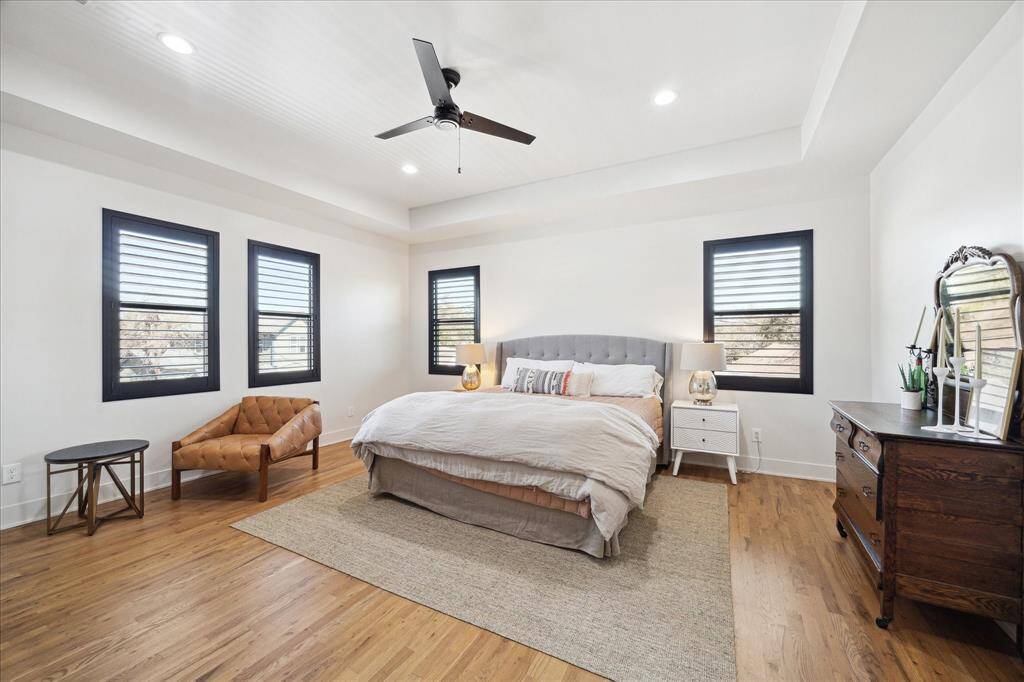 Spacious primary bedroom suite, with views of downtown.